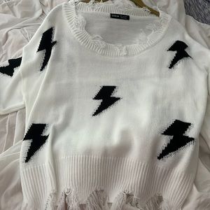 sweater with lightening bolts